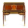 A Louis XVI Style Gilt Bronze Mounted Marquetry Bureau a Cylindre Height 42 x width 43 3/4 x depth 26 inches.