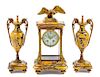 * A French Gilt Metal Mounted Marble Clock Garniture Height of mantel clock 17 1/4 inches.