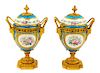 A Pair of Sevres Style Gilt Metal Mounted Porcelain Urns Height 11 1/4 inches.