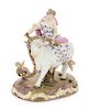 A Meissen Porcelain Figural Group Height 10 1/4 inches.