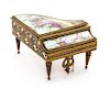 A Viennese Enameled Piano-Form Music Box Width 6 inches.