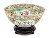 A Rose Medallion Porcelain Punch Bowl Height 3 3/4 x diameter 9 3/8 inches.