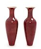 A Pair of Chinese Sang de Boeuf Porcelain Vases Height 9 1/4 inches.