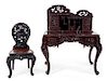 * A Japanese Carved Desk and Side Chair Height of desk 52 1/2 x width 45 1/2 x depth 26 1/4 inches.