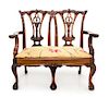 A George III Mahogany Child's Bench Height 25 2/4 x width 28 1/4 x depth 14 inches.