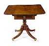 A Regency Mahogany Pedestal Pembroke Table Height 28 1/2 x width 36 x depth 19 inches (closed).