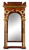 A Regency Parcel Gilt Rosewood and Mahogany Pier Mirror Height 70 x width 34 inches.