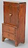 Miniature cabinet/secretary Bath, Maine, with two doors over two drawers on boot jack ends with traces of old white wash, now refini...