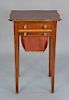 Federal mahogany work table with shaped top over drawer and bag drawer set on square tapered legs, circa 1800. 
height 29 1/2 in., t...