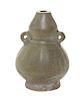 * A Celadon Glaze Pottery Double Gourd Vase Height 3 1/4 inches.