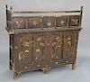 Chinese paint decorated cabinet with cribbed top over four doors, all in old paint. 
height 45 1/4 in., width 44 3/4 in.