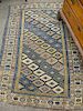 Caucasian Oriental throw rug (end borders missing). 
4'5" x 7'