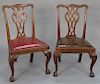Pair of George II mahogany side chairs, England 1760-80, mahogany with beech slip seat (side stretchers missing). 
height 36 3/4 in....