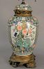 Famille Verte Chinese porcelain covered jar made into a table lamp with bronze base and mount. vase height with cover 12 1/2 in., t...