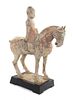 * A Pottery Horse and Rider Height 13 1/4 inches.