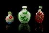 * Three Peking Glass Snuff Bottles Height of tallest 3 inches.