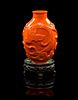 A Carved Red Coral Snuff Bottle Height 2 3/8 inches.