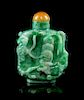 A Carved Jadeite Snuff Bottle Height 1 3/4 inches.