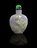 * A Carved Jadeite Snuff Bottle Height 2 1/8 inches.