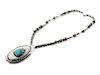 Southwestern Silver and Turquoise Pendant Height of pendant 3 3/4 inches.
