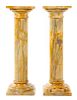 A Pair of Marble Pedestals Height 43 1/2 inches.
