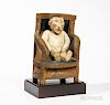 Carved and Painted Baby in a Chair Figure