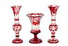 Pair of vases and vase in ruby red and carved Bohemia cryst Pareja de jarrones y jarrón en cristal de Bohemia doblado e