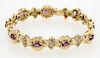 A 14kt yellow gold Ruby and Diamond link bracelet