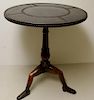 Leathertop Pedestal Table With Shoe Feet.