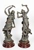 A Pair of Cast Metal Figures Height of taller 21 3/4 inches.
