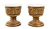 A Pair of Giltwood Pedestals Height 17 3/4 x diameter of top 17 1/2 inches.