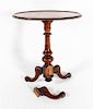 A Regency Style Walnut Tea Table Height 28 1/2 x diameter of top 25 inches.
