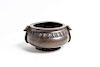 A Chinese Bronze Censer Height 2 1/2 x width over handles 5 1/2 inches.
