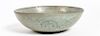 * A Celadon Stoneware Bowl Diameter 7 3/4 inches.