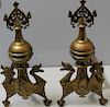 Pair Of Brass Sea Horse Form Andirons.