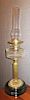 A Victorian Brass Hurricane Oil Lamp, Height 27 inches.