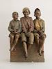 FREDERICK GOLDSCHEIDER (1845-1897): THREE BOYS SEATED ON A LEDGE