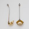 A George Sharp Silver Strainer and Ladle with Figural Details