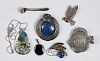 Group of assorted sterling silver jewelry.
