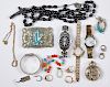 Assorted group of costume jewelry and watches.