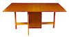 * George Nelson and Associates, (American, 1980-1986), Herman Miller, c. 1946 gate-leg dining table model 4656