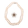 A Strand of Cultured Pearls & Starburst Pin
