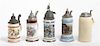 A Collection of Five German Porcelain Steins, Height of tallest 12 inches.