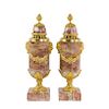 A PAIR OF RED MARBLE URNS WITH GILT BRONZE APPLIQUES.