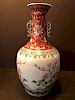 A Fine Chinese Famille Rose vase with flowers , marked Qianlong