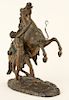BRONZE FIGURE OF A MAN WITH REARING HORSE