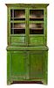 A Rustic Green-Painted Bookcase Height 78 x width 41 x depth 22 inches.