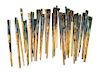 A Collection of Roger Brown's Paint Brushes Length of longest 16 inches.