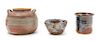 Three Glazed Ceramic Bowls Height of tallest 5 inches.