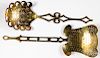 Two elaborate brass straining ladles, 20th c.